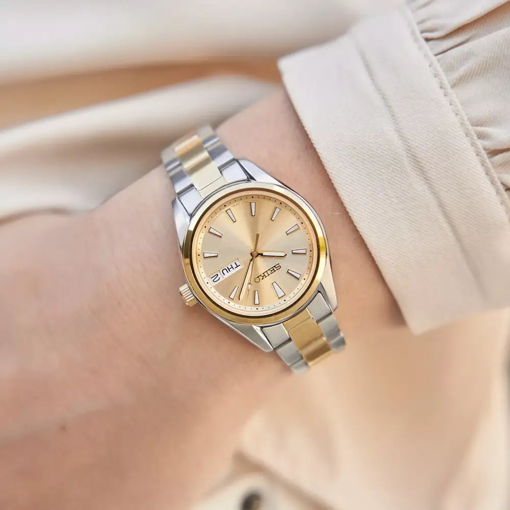 Seiko Classic SUR354P1 Quartz Day-Date Gold Dial 30mm Stainless Steel Women's Watch