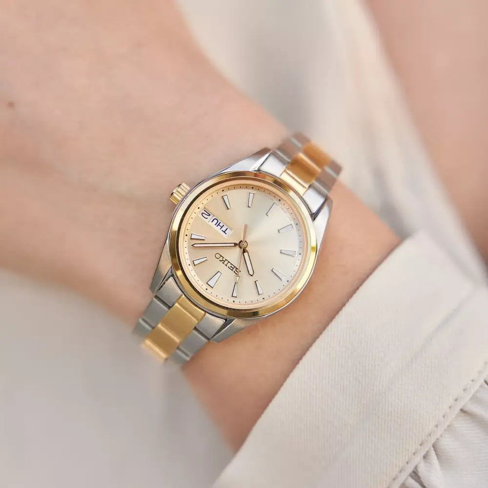 Seiko Classic SUR354P1 Quartz Day-Date Gold Dial 30mm Stainless Steel Women's Watch