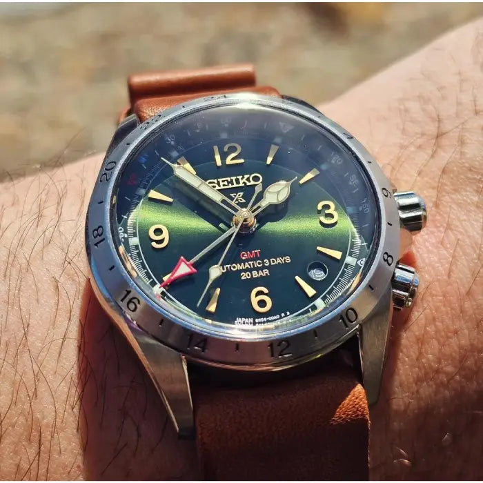 Seiko Prospex SBEJ005 green dial GMT men's watch close up dial texture and markers